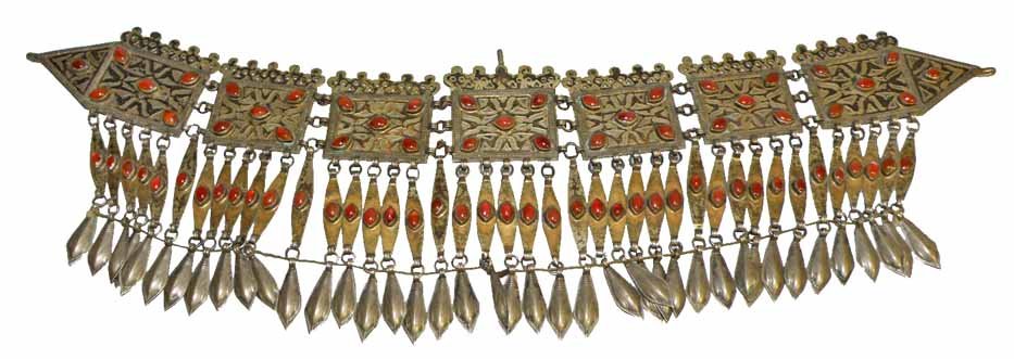 TURKOMAN COIN SILVER WAIST BELT: With carnelian stone mounts and gold wash. Very minor wear. Total weight 500 grams. Probably early 20th century. 21 1/2" long x 6" tall
