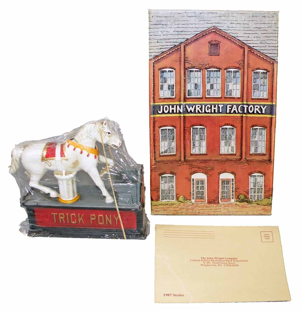 MIB TRICK PONY MECHANICAL BANK: Cast Iron bank by John Wright. #161/250 in series. With original paperwork and packing. Original box - Excellent.13" Long