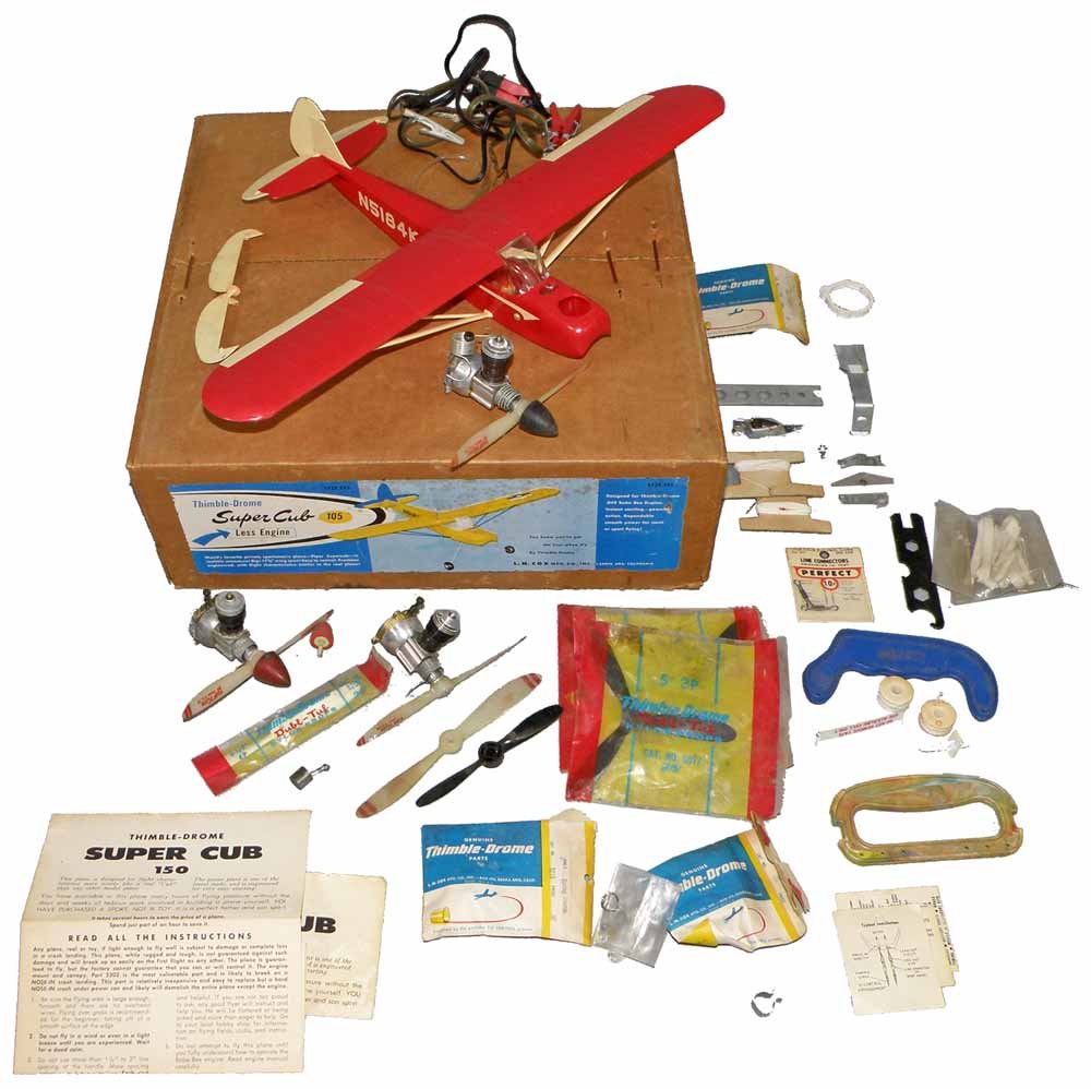 BOXED THIMBLE-DROME SUPER CUB 150: Appears complete except for landing gear. Comes with lots of spare parts. No damage to fuselage. Original box is crisp and complete. Box - Excellent.11 1/4" Long, 17 1/2" Wide