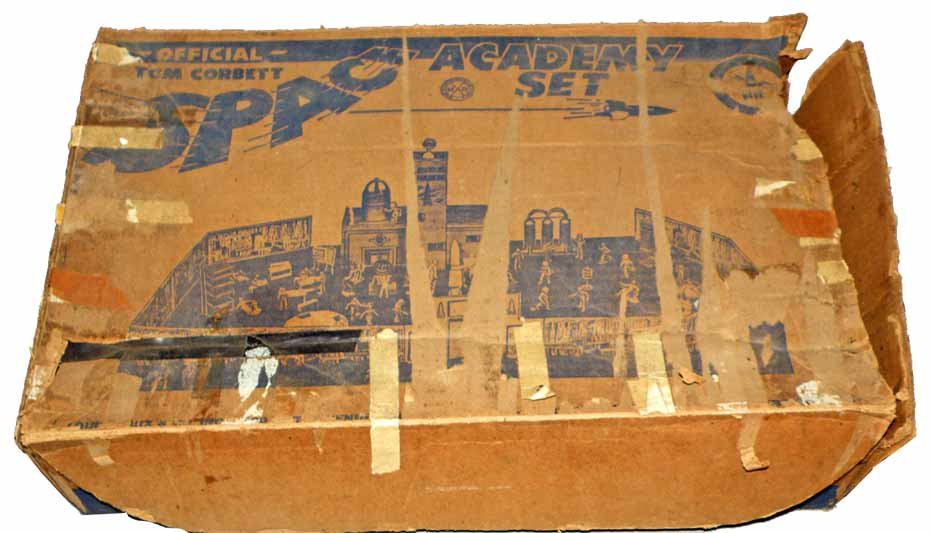 BOXED REX MARS PLAYSET IN TOM CORBETT BOX: Marx playset appears mostly complete. Tom Corbett box shows wear and damage. Box - Fair.23" x 15"