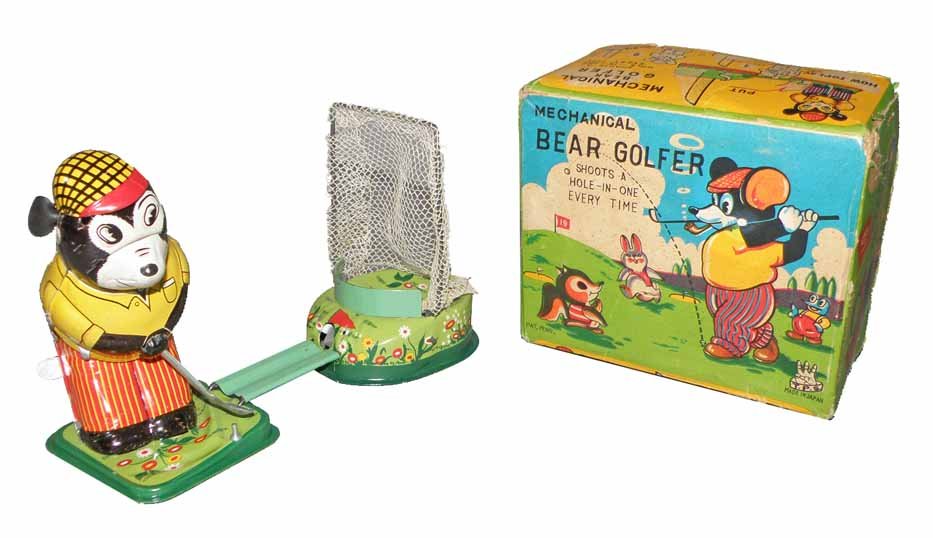 BOXED TPS BEAR GOLFER: Tin wind-up toy works fine. One ear detached but in box. Missing golf balls. Original box shows some wear and creasing. Box is Good-VG.4 1/2" Tall