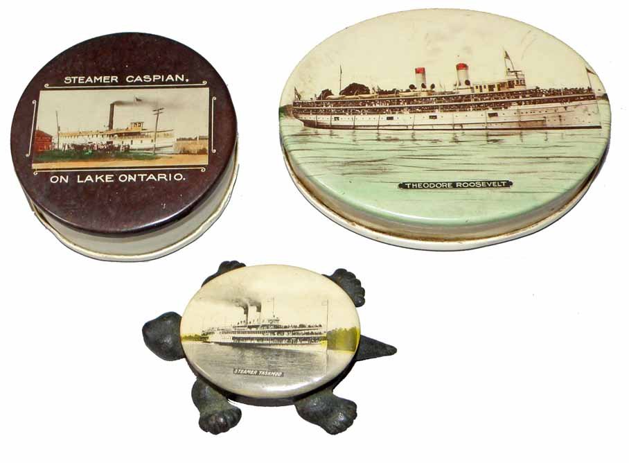 THREE CELLULOID AND METAL STEAMSHIP PAPER WEIGHTS: Includes a cast iron and celluloid turtle for the Tashmao, The Caspin, and Theodore Roosevelt. Minor celluloid damage.Largest 3 1/4" Long