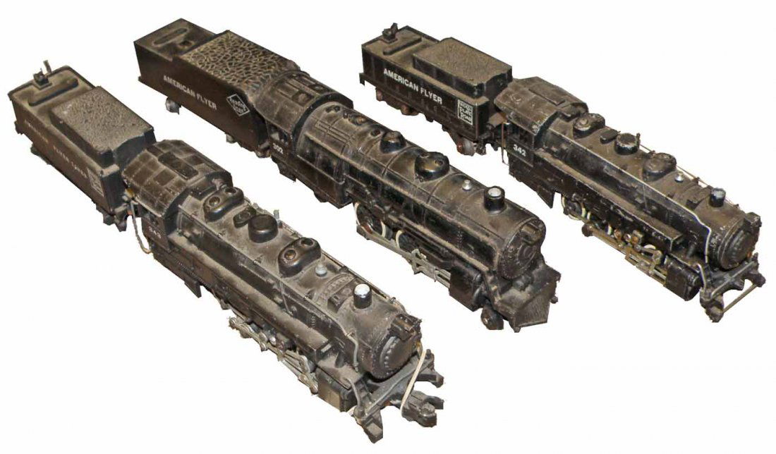 THREE AMERICAN FLYER ENGINES AND TENDERS: #342 Engine from Nickel Plate Road, #343 Engine and #302 from Reading lines. All show play wear. Not tested.largest 15" long