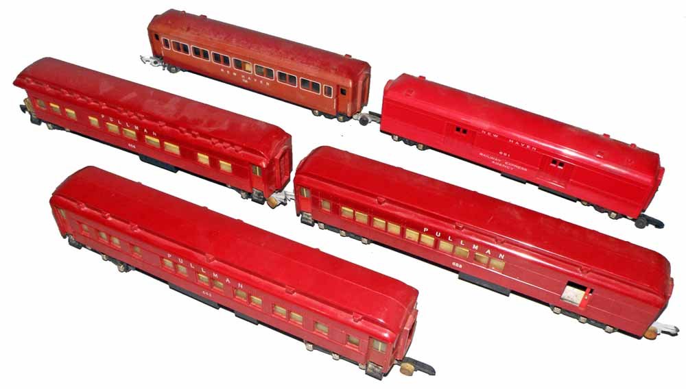 FIVE AMERICAN FLYER RAILROAD CARS: Three Pullmans #652, #653 and #654. #651 REA car and 735 New Haven car.11" Long