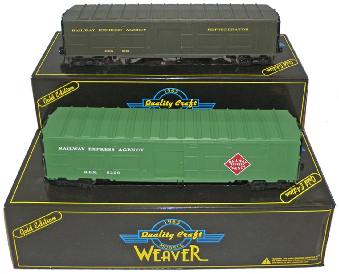 TWO BOXED WEAVER FREIGHT CARS: World War II Troop Train, REA reefer car, and REA box. Size: 14 1/2" long