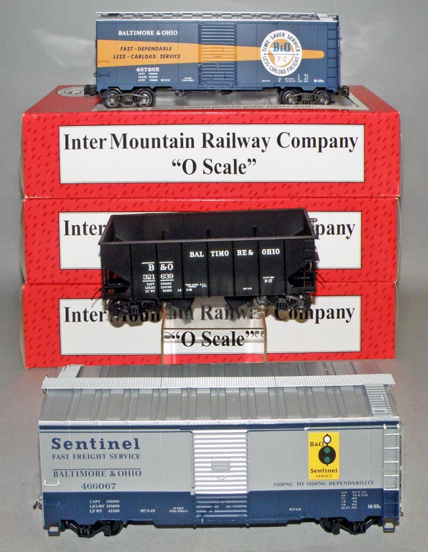 THREE BOXED INTERMOUNTAIN B&O FREIGHT CARS: #25401s two bay hopper, #25143s Sentential box car, and #25146 box car Size: 11" long