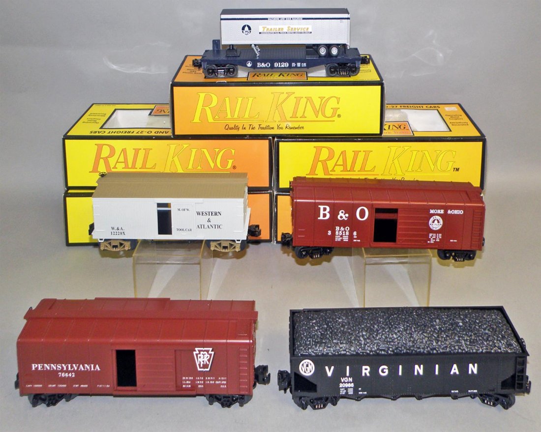 FIVE BOXED RAIL KING FREIGHT CARS: #30-7418 PRR, #30-7633 B&O Flat car, #30-7439 WARR Box car, #30-7429 B&O Box car, #30-75111 Virginian Hopper. Size: largest 11 1/2" long