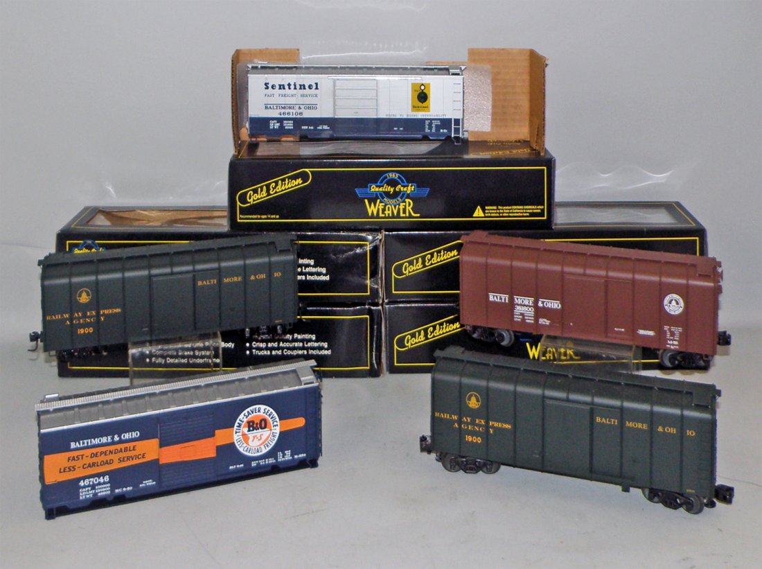FIVE BOX WEAVER B&O FREIGHT CARS: Two REA box cars, Sentinel box car, Time saver box car, and B&O box car. Size: 11 3/4" long