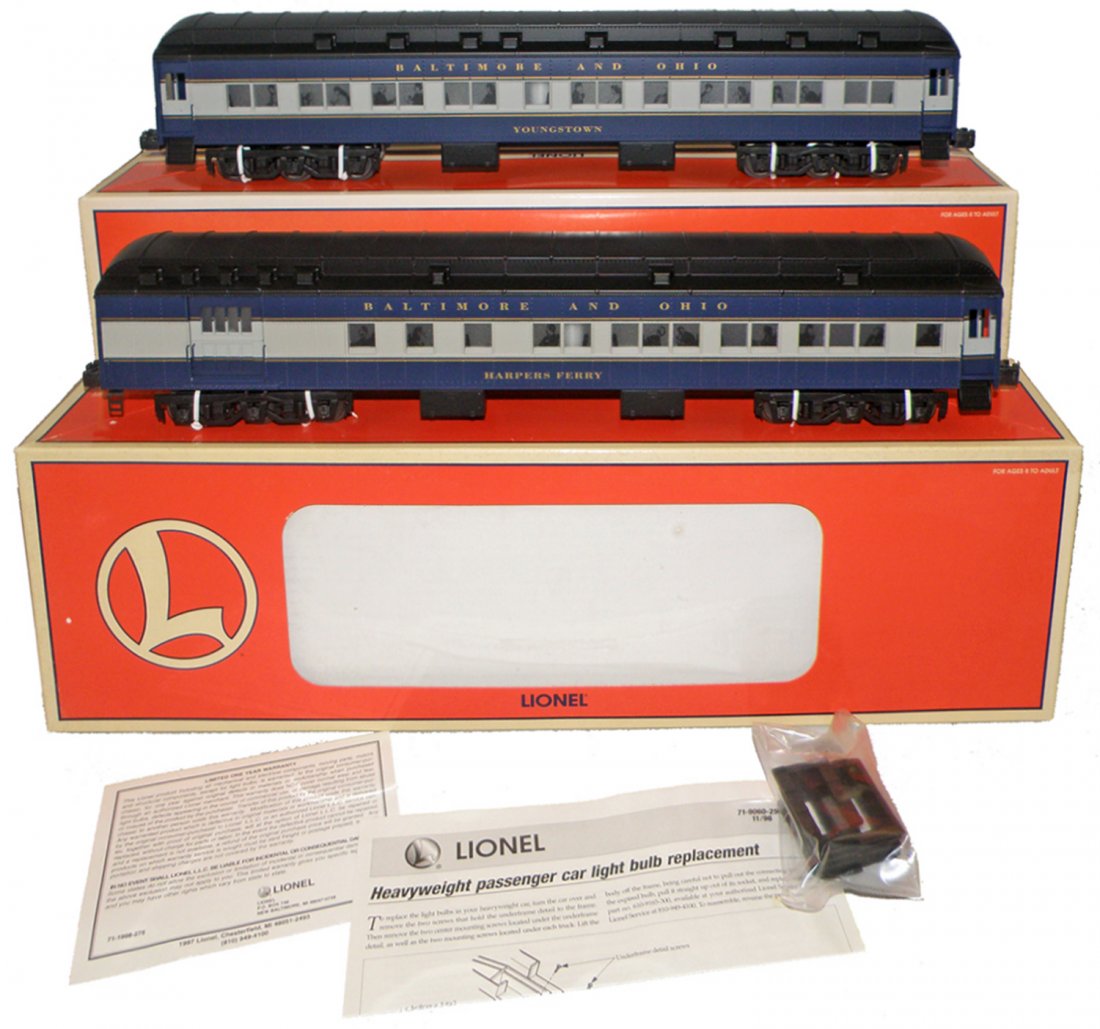 TWO BOXED LIONEL B&O PASSENGER CARS: Unused, #6-39014 Harpers Ferry combo cars. #6-39015 Youngstown coach car. Size: 19 1/2" long