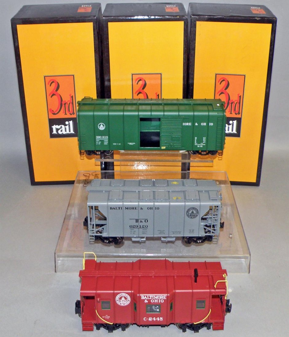 THREE BOXED B&O CARS BY THIRD RAIL: Unused O Scale, #2045 B&O Caboose, 380810 B&O Box car, #629120 B&O Hopper. Size: 12" long