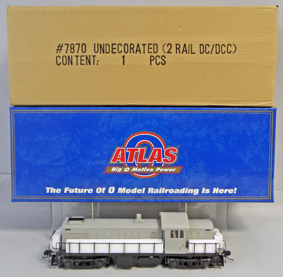 BOXED ATLAS ALCO RA-1 DIESEL LOCOMOTIVE: #7870 undecorated, comes in original shipping box, complete with paperwork. Size: 14 1/2" long