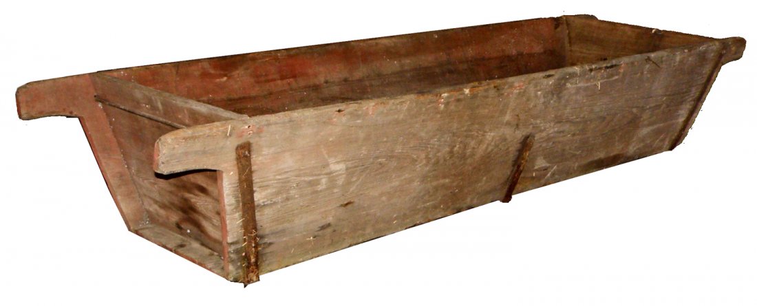 ANTIQUE HOG SCALDING TROUGH: Made of heart pine with iron strapping. Traces of old paint to surface. 95 1/2" long x 29 1/2" wide x 18" tall
