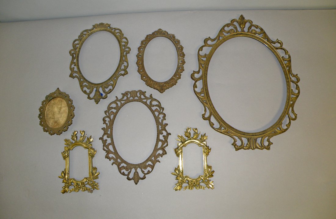 LOT OF SEVEN BRASS FRAMES: Decorative frames. Some are antique. largest 15 1/4" tall