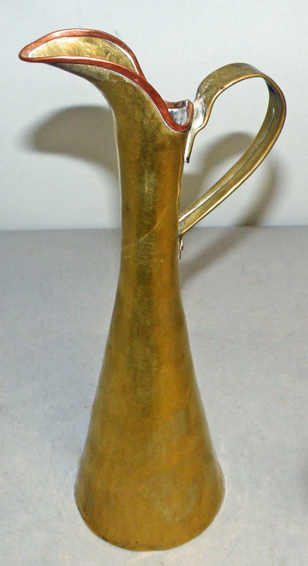 RUSSIAN BRASS AND COPPER EWER: Hallmarked on bottom probably late 19th century. Hand made with dove tail construction. 10 1/4" tall