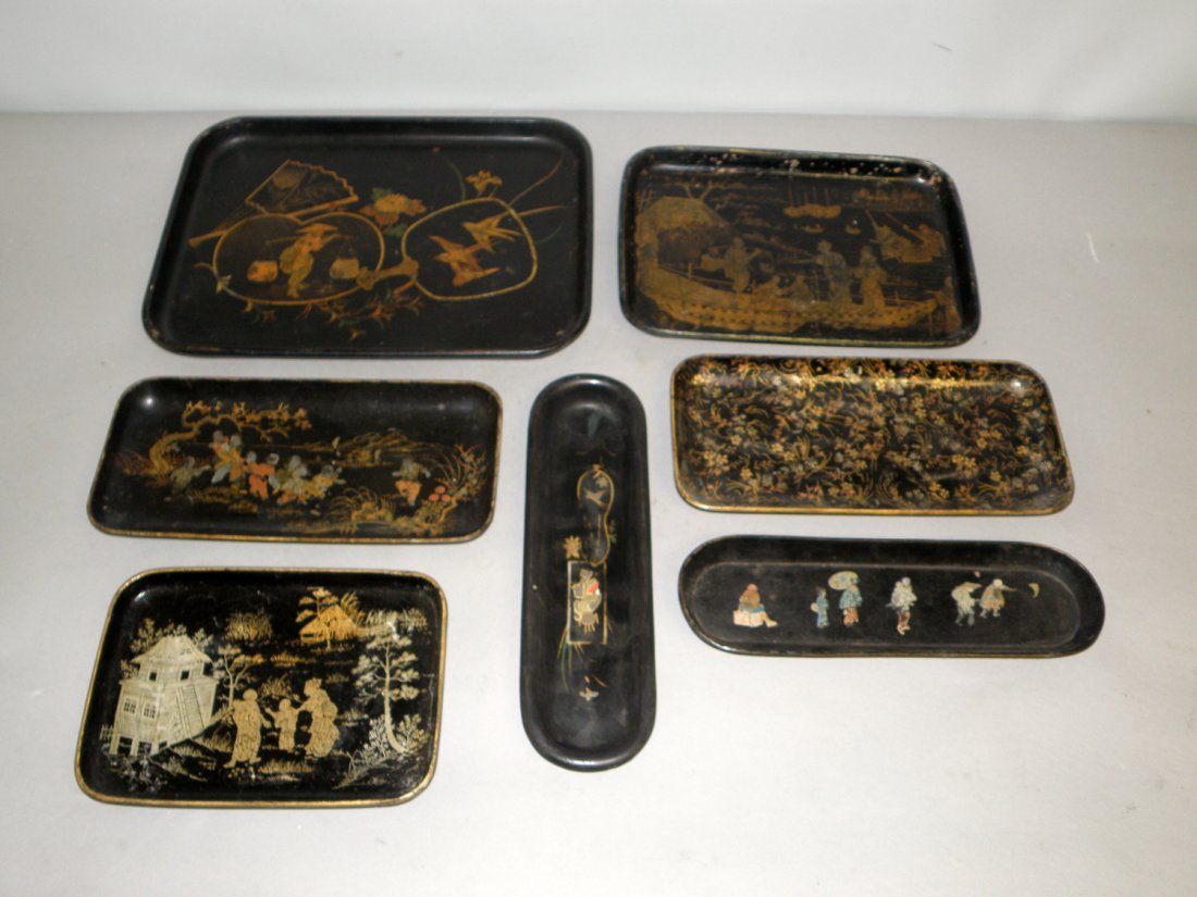 LOT OF PAPIER-MACHE TRAYS: Seven trays all with oriental scenes. Some surface wear. largest 12 1/2" wide