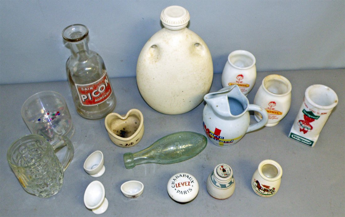 PORCELAIN AND GLASS ADVERTISING WARE: Includes porcelain door knob, product bottles etc. Varies