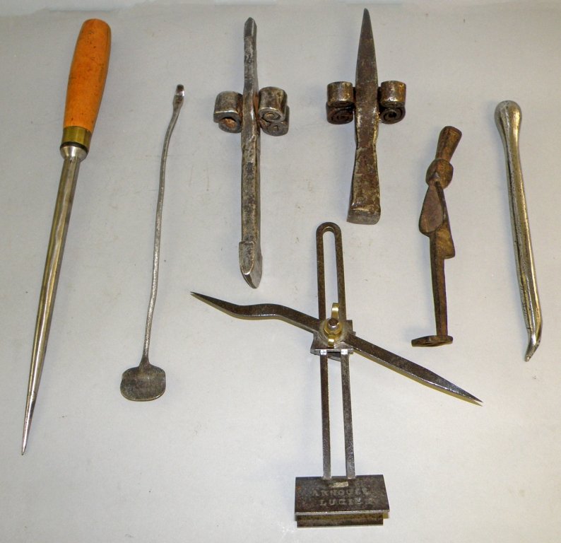 INTERSTING ANTIQUE TOOL LOT: Includes two early hand forged chisels, tool marked ARNOUIL LUCIEN 1917. Seven pieces total. One of the chisels has old blacksmith repairs. largest 18 3/4" long