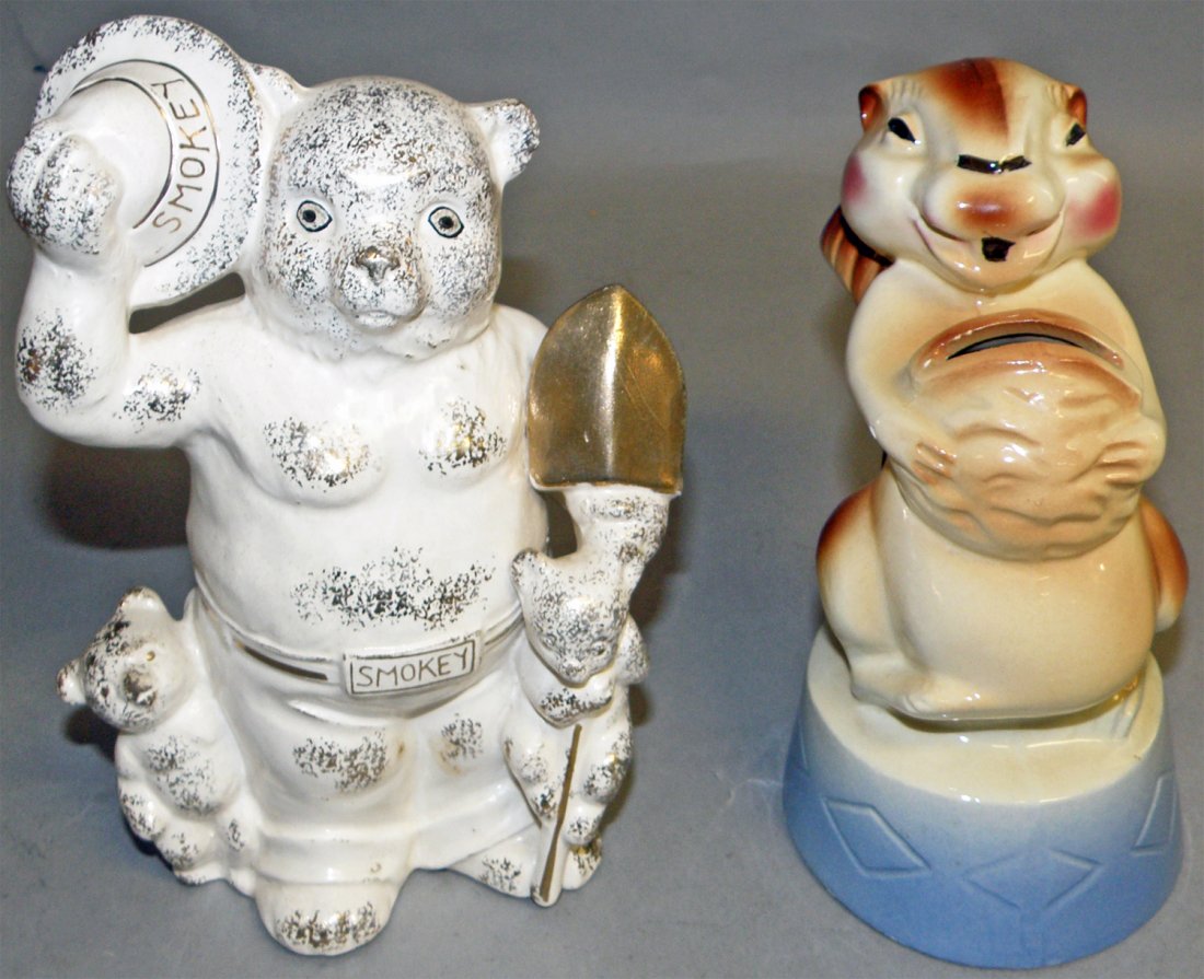 TWO CERAMIC STILL BANKS: American Bisque squirrel with nut, with a couple chips and hairlines and a Smokey the Bear bank. Largest 7 1/4" tall