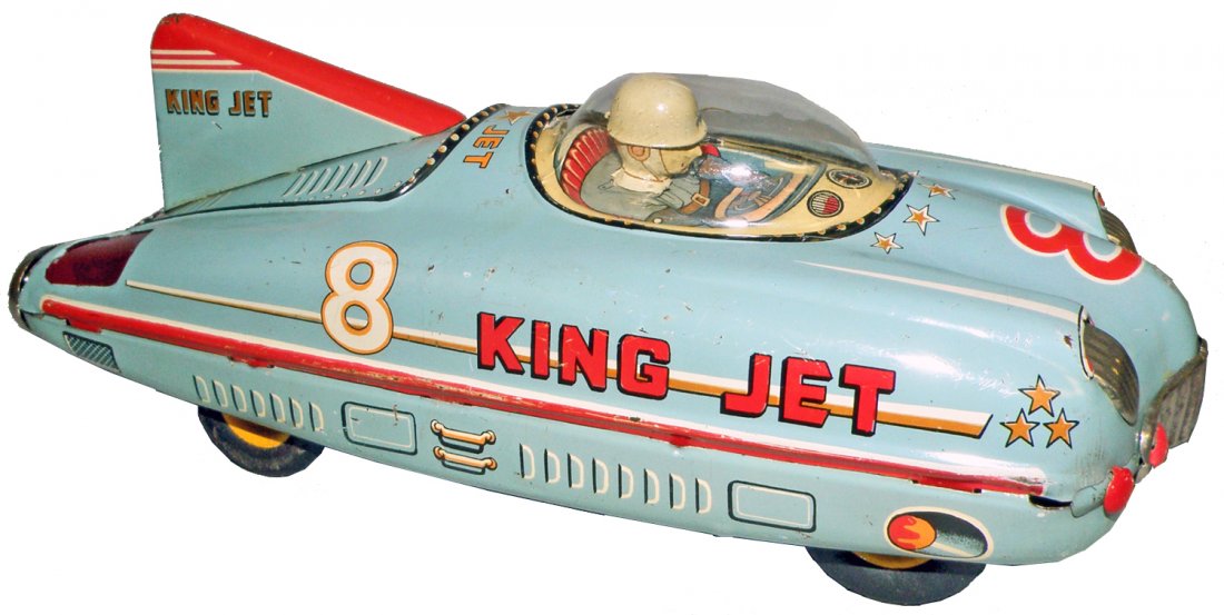JAPANESE KING JET RACER: Space age friction operated car with original plastic dome marked "MSK" on bottom. Scattered light scratching and play wear. 12" long