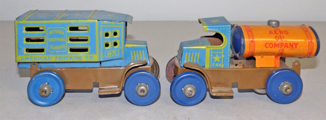 TWO MARX MACK TRUCKS: Aero Oil Company Tanker & American Trucking company moving truck. Both have minor wear. largest 5 1/4" long