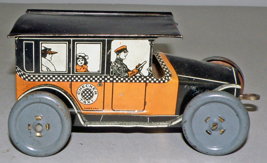 CHECKER CAB BY MOHAWK TOYS: 1920's wind up tin toy works fine. Light wear. 6 1/2" long x 8" tall