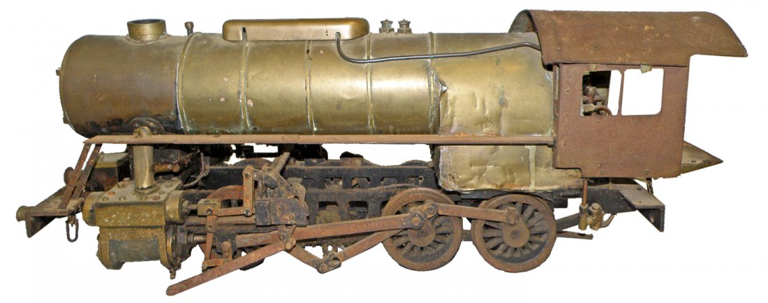 EARLY 2-8-0 LIVE STEAM LOCOMOTIVE: Copper, sheet steel, iron and brass parts. Locomotive wheel configuration is 2-8-0. Comes with box of spare parts. Nears some restoration. Bottom of boiler tube retains traces of green paint. Appears 