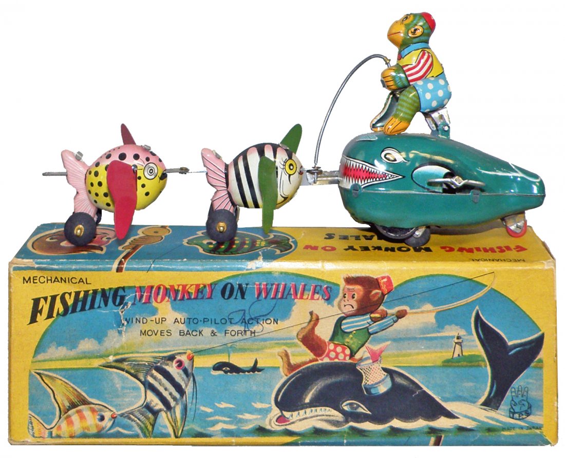BOXED TPS FISHING MONKEY ON WHALE: Toy shows box wear only. Complete original box has some wear and aging. Box - Fine. 8 3/4" long