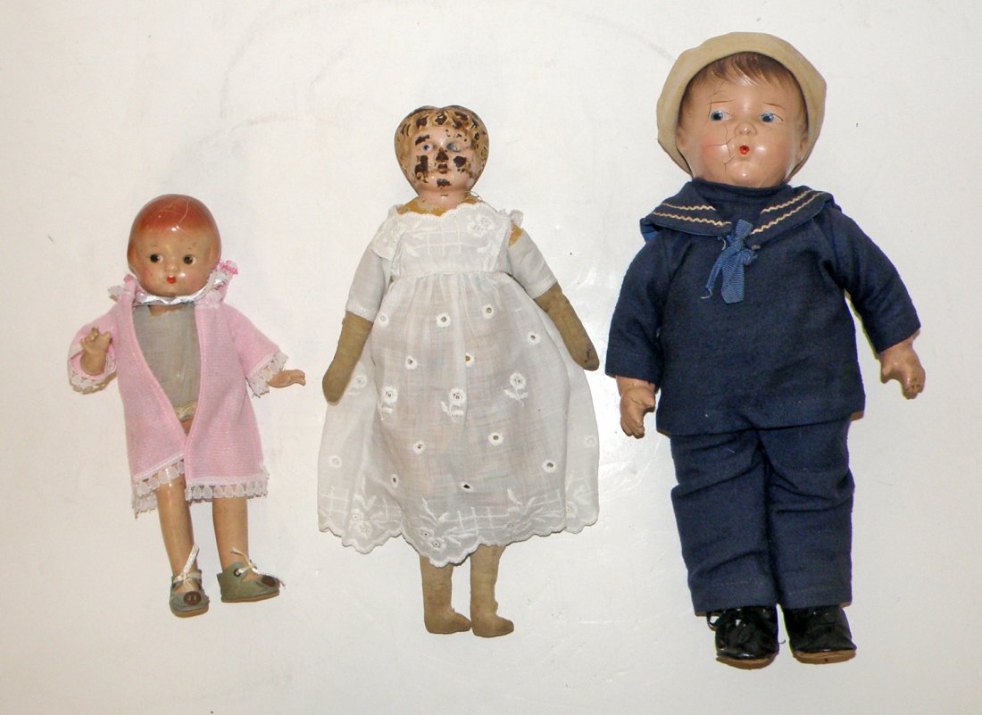 THREE DOLLS: One Patsyette by Effanbee, a cloth and composition boy sailor and a tin and cloth minerva head doll. Largest: 13 1/4" tall