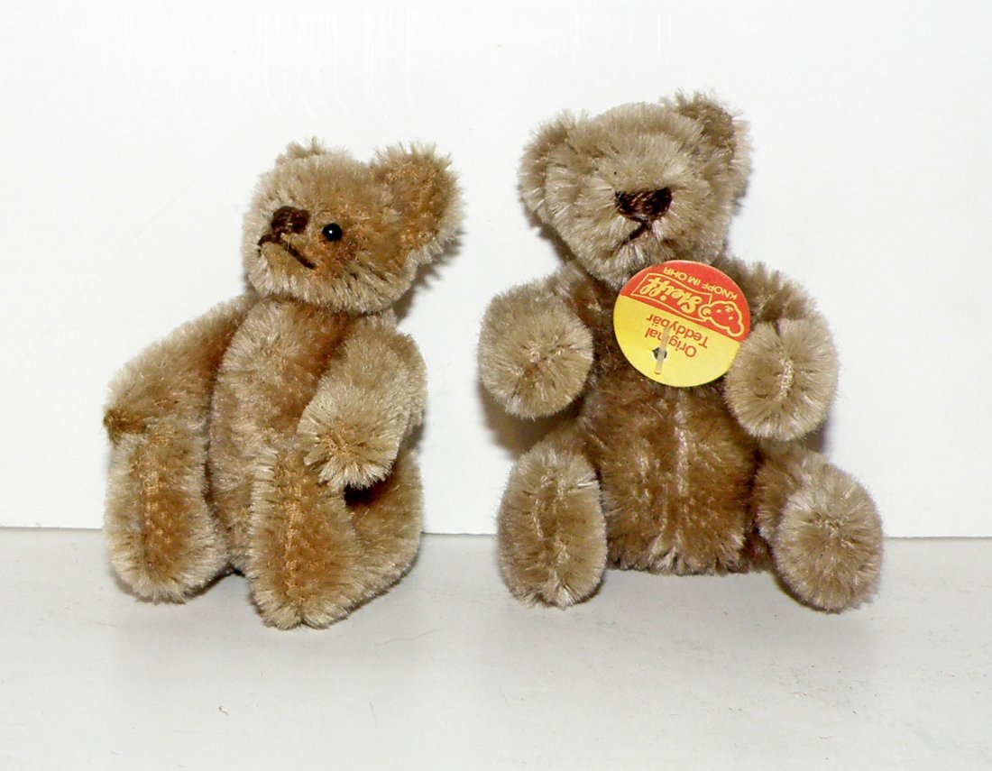 TWO JOINTED MINIATURE BEARS: Steiff original teddy with tag and a fully jointed Schuco or Steiff teddy. Largest: 3 1/2" tall