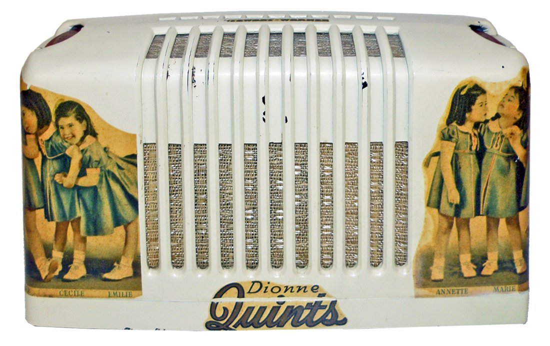 DIONNE QUINTUPLETS STUART WARNER RADIO: Smallest of three sizes made. Complete with original bottom cover and retains very minor paint wear. Works but needs antenna 9 1/2" long x 4 3/4' tall