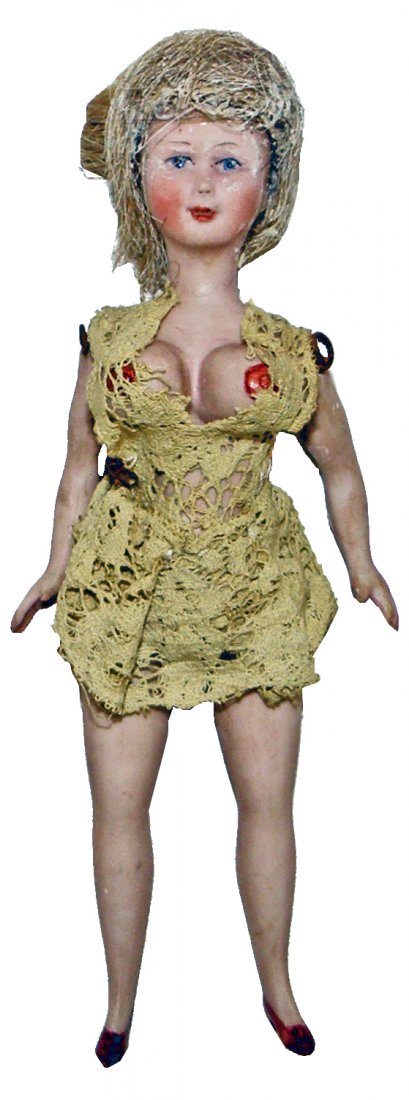 GERMAN BISQUE "TETONNA" DOLL: Scarce doll with exaggerated breasts reportedly used in Argentinian brothels. Complete with original wig and clothing. Jointed Bisque body 6 1/4" tall