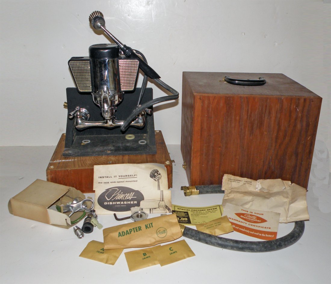 CASED SALESMAN SAMPLE PRINCESS DISHWASHER: Sink mounted dishwasher set up is complete with paperwork and all parts. Original wood carry case. Some storage discoloration. Unusual item. 15" long x 14 3/4" tall
