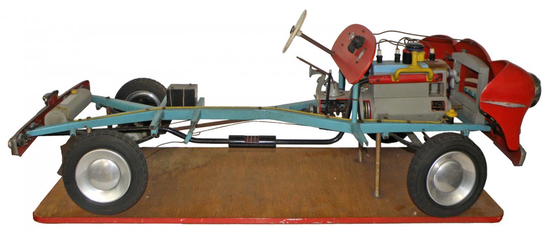 GERMAN AUTOMOTIVE DRIVING SCHOOL MODEL: Full chassis with engine and running gear by VVR aka Verkehrs - Verleg Remagen. Complete. Not tested. Light wear. 54" long