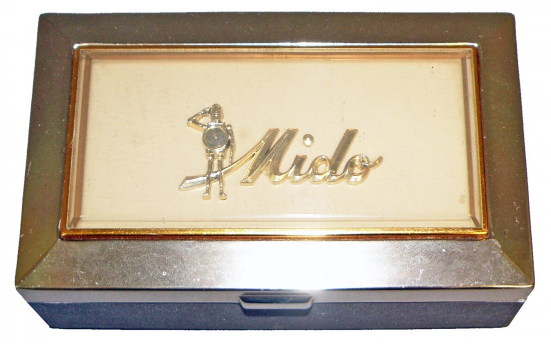 MIDO ROBOT WATCH BOX: Metal box with clear plastic insert on lid, no watch or insert included, some surface wear. 6" x 3 1/2"