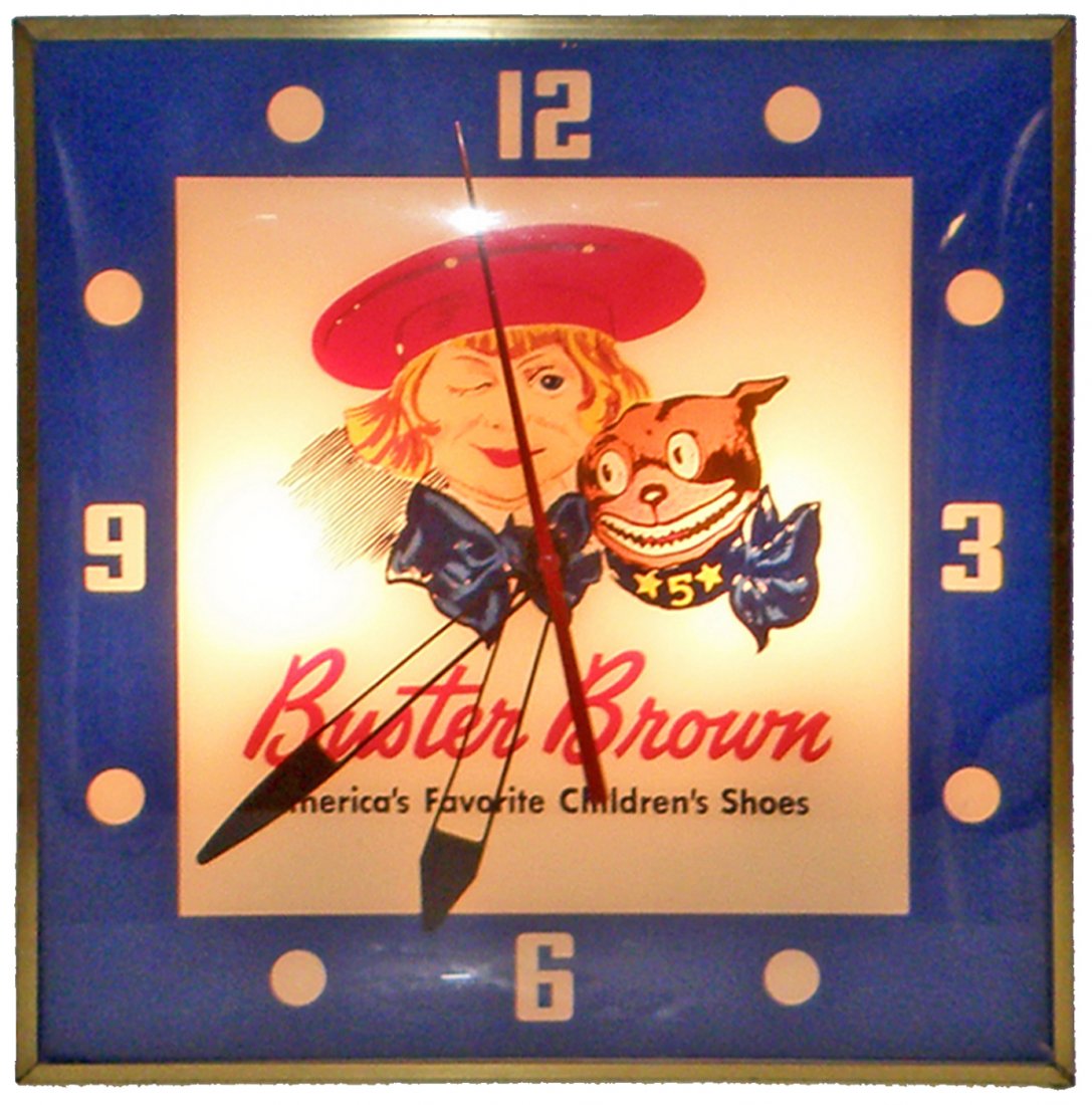 BUSTER BROWN SHOES CLOCK: Lighted clock with reverse on glass image of Buster and Tighe, works fine. A couple small paint nicks to face. 15 1/2" x 15 1/2"