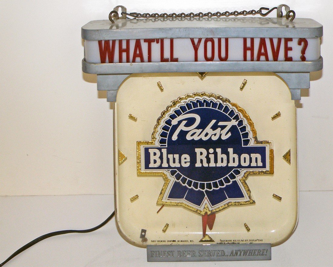 PABST BLUE RIBBON CLOCK: Working hanging clock by Price Brothers. Top light needs new bulb. Back of case shows wear. The ultimate Hipster accessory! 13" tall x 13 1/4" wide