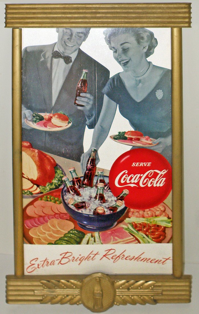 CARDBOARD COCA-COLA SIGN IN ORIGINAL KAY FRAME: 1955 Cardboard sign has some surface scuffing. Original frame has minor surface wear. Sign is Very good. 31 1/2" tall x 19" wide