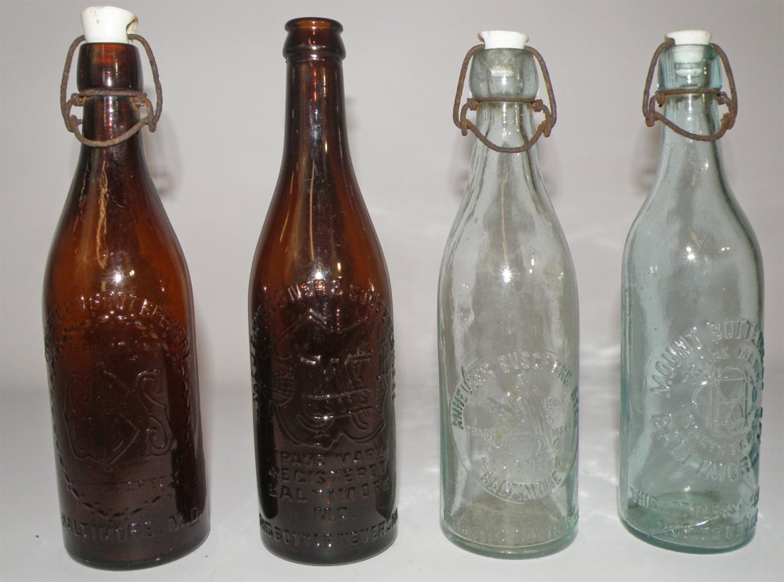 FOUR EARLY BALTIMORE BOTTLES: Baltimore beer bottles from Mount Bottling Co, Anheiser Busch, Eigenbrot Brewery, and J. F. Weissner & Sons. 10" t