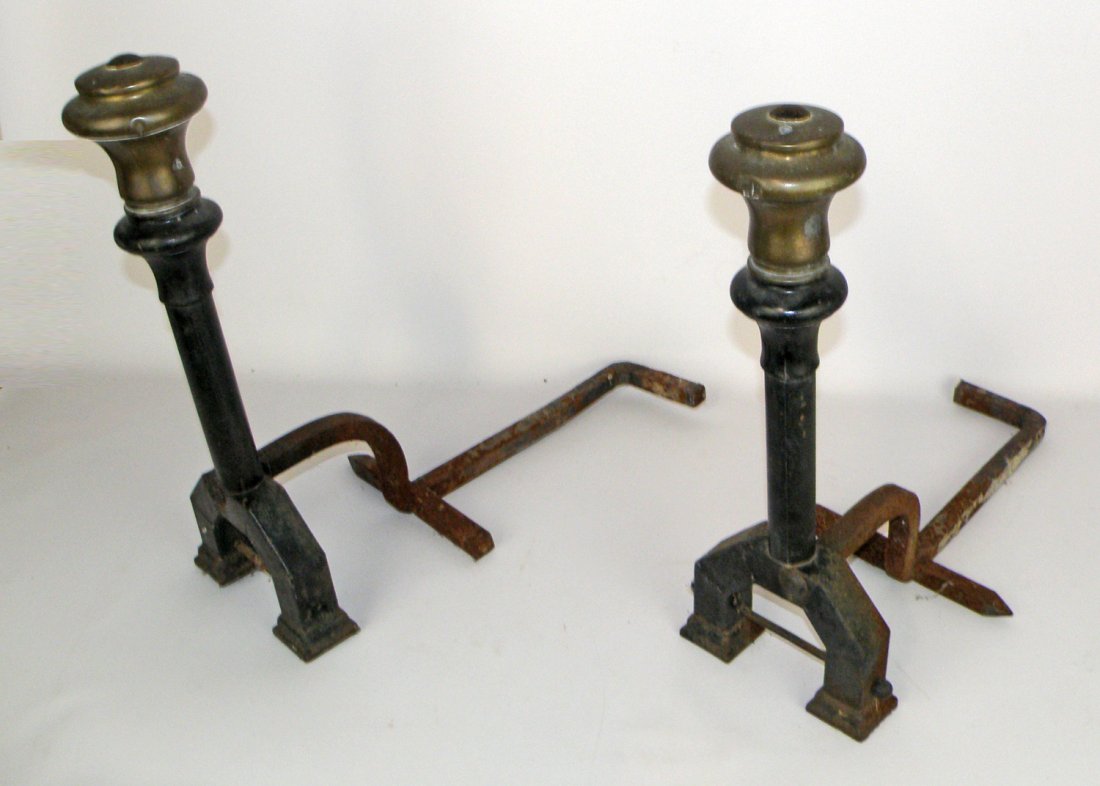 PAIR OF IRON & BRASS FIREPLACE ANDIRONS: Early 20th Century. Shows age & use wear. 20" tall x 23" long