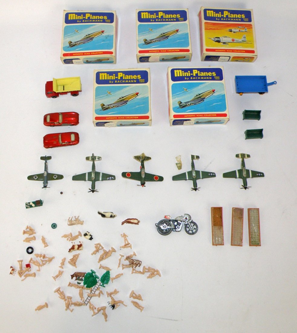 DIECAST AND TRAIN FIGURE LOT: HO scale includes Matchbox No. 70 truck, two No. 32 Jags, Bachman airplanes, station figures, etc. Varies