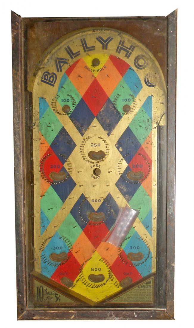 BALLY HOO TABLE TOP PINBALL MACHINE: Bally's first Machine. Comes with original balls. All original. Missing wood from end. 31" long x 16" wide