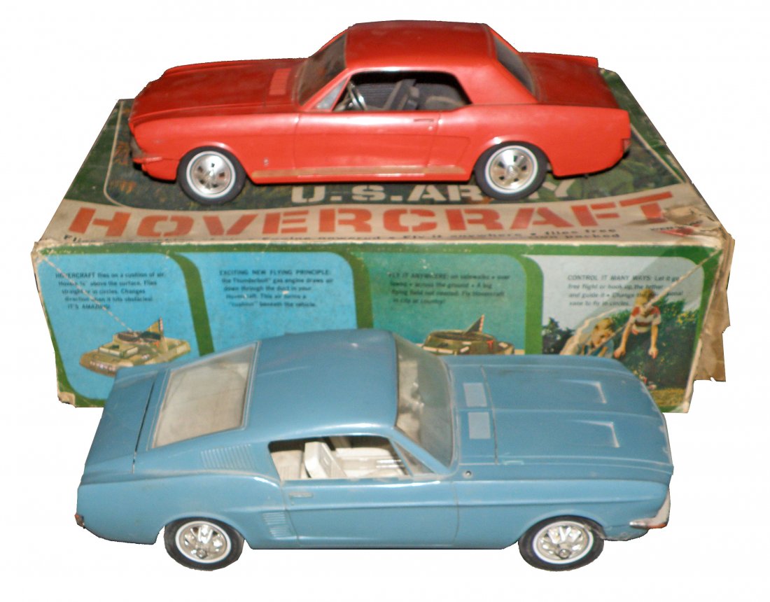 THREE WEN-MAC VEHICLES: Boxed Army Hover craft. Mustang Coupe and Mustang Fastback. All show some play wear. Box for Hover craft is good. varies