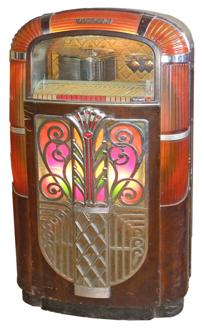 ROCK-OLA 1426 JUKEBOX: Coin operated. Plays but needs amp rebuilt. Good plastic. Some scuffing to case. 58" tall x 30" wide x 28" deep