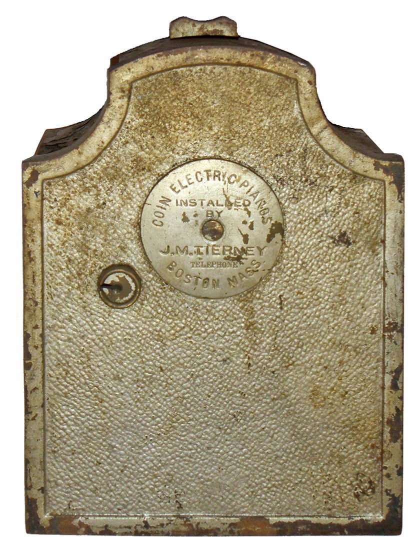 ORCHESTRION COIN WALL BOX: Cast iron wall box from J.M.Tierney. Some surface wear. 7 1/2" tall x 5 1/2" wide