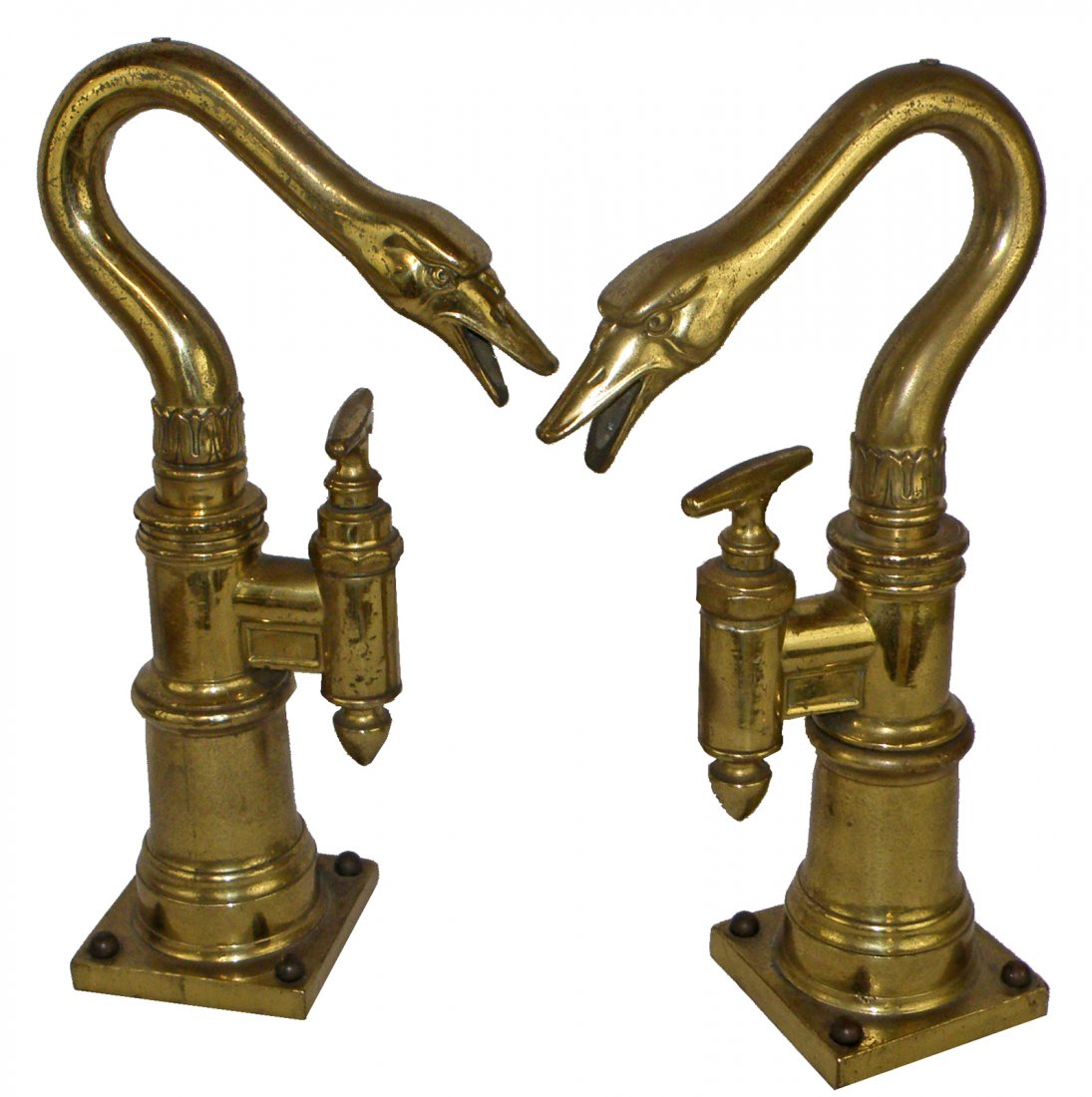 A PAIR OF ANTIQUE FIGURAL BRASS BEER TAPS