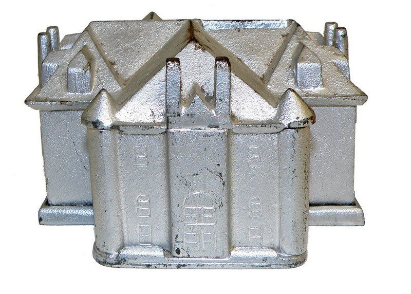 CAST IRON ADVERTISING BANK: Made by Service Foundery, Wichita, Kansas. Promotes Westwood Bronze Memorials. Light paint wear. 5 1/2" long