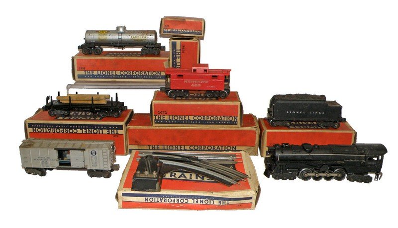 BOXED LIONEL TRAINS: All boxes have original inserts. Includes 2020 Locomotive, 3451 Lumber car, 2020w Tender, 2555 Tanker car, 2472 Caboose, 3454 Merchandise car, 1121 switch and 167 Whistle control box only. Not tested.