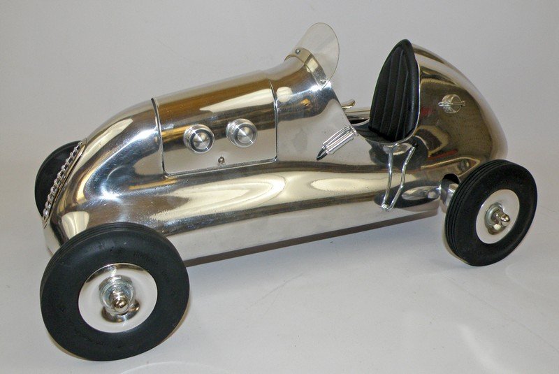 BREMER GAS POWERED RACE CAR: Polished cast aluminum Doling front drive car by Singe Corp. These cars are no longer being manufactured. No engine. 18 1/2" long