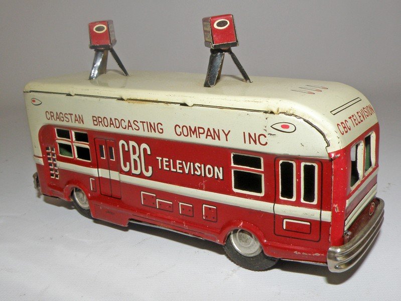 CBC TELEVISION TRUCK: Red body friction truck with a couple of minor rubs to roof. Made by Asahitoy. 6 1/4" long