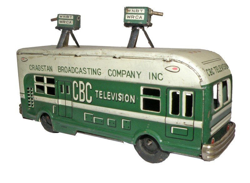 CBC TELEVISION TRUCK: Green body friction truck with some surface wear. Missing hubcaps. Made by Asahitoy. 6 1/4" long